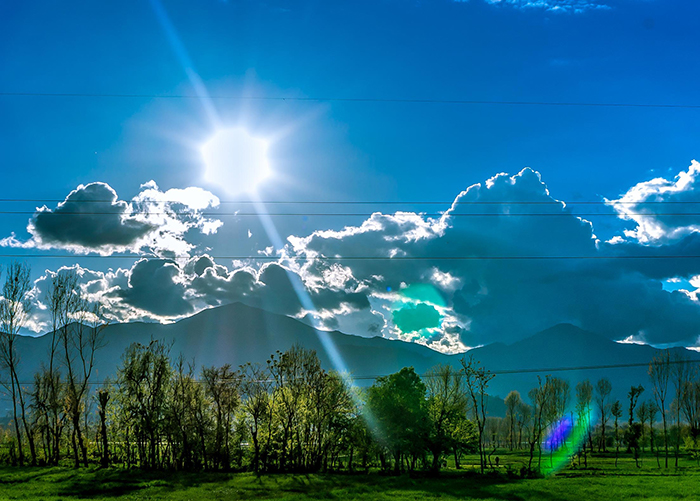 sunny day with mountain background